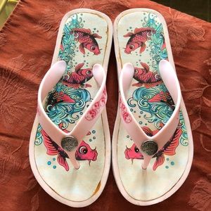 Used Ed Hardy flip flops size 8